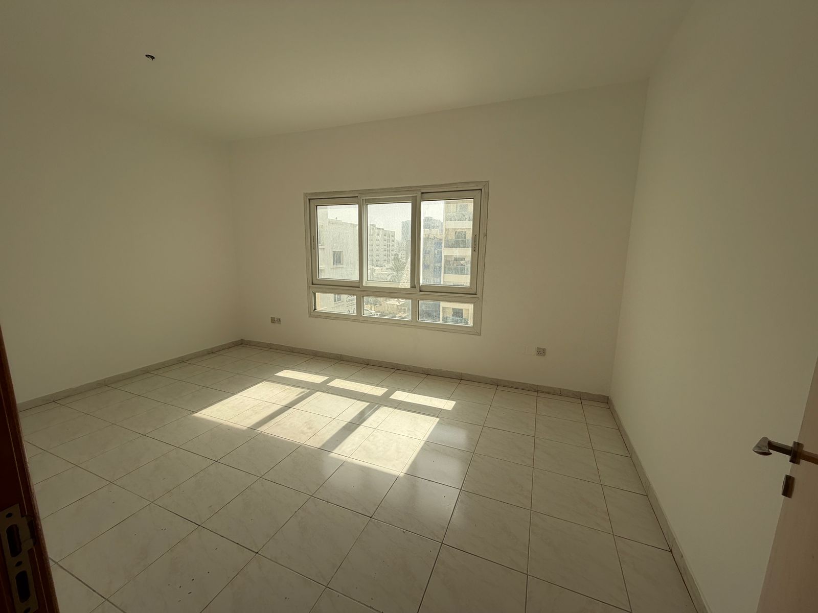 Beautiful apartments with spacious layouts for annual rent in Al Rashidiya 2, Ajman. Two-bedroom apartment with a living room, two bathrooms, a master