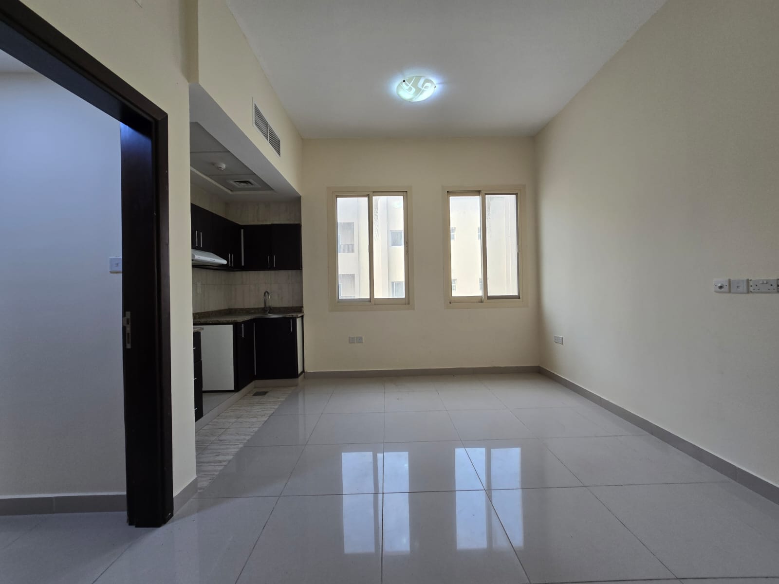 One bedroom and living room apartment at the lowest price in Al Rawda, near Sheikh Ammar Street. Flexible payment options. Close to all services. Easy