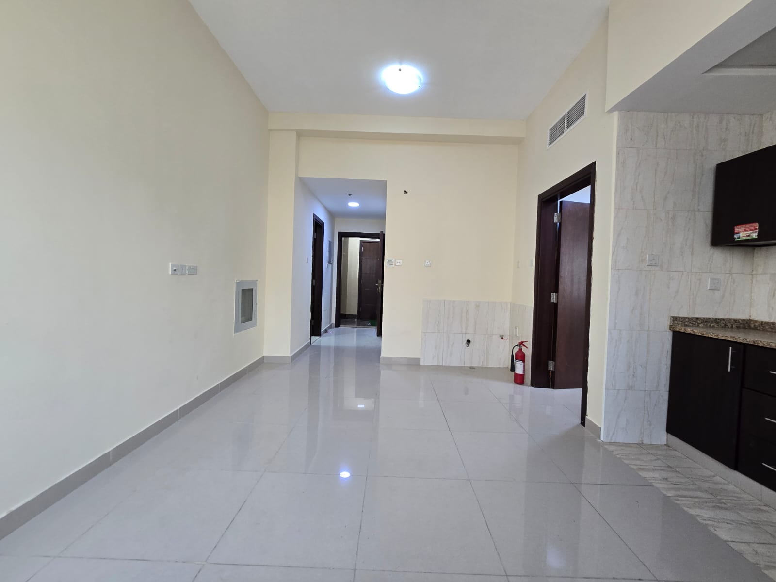 Great opportunity to live in a brand new building with a completely new apartment located in Al Rawda 1, close to Sheikh Ammar Street, with easy acces