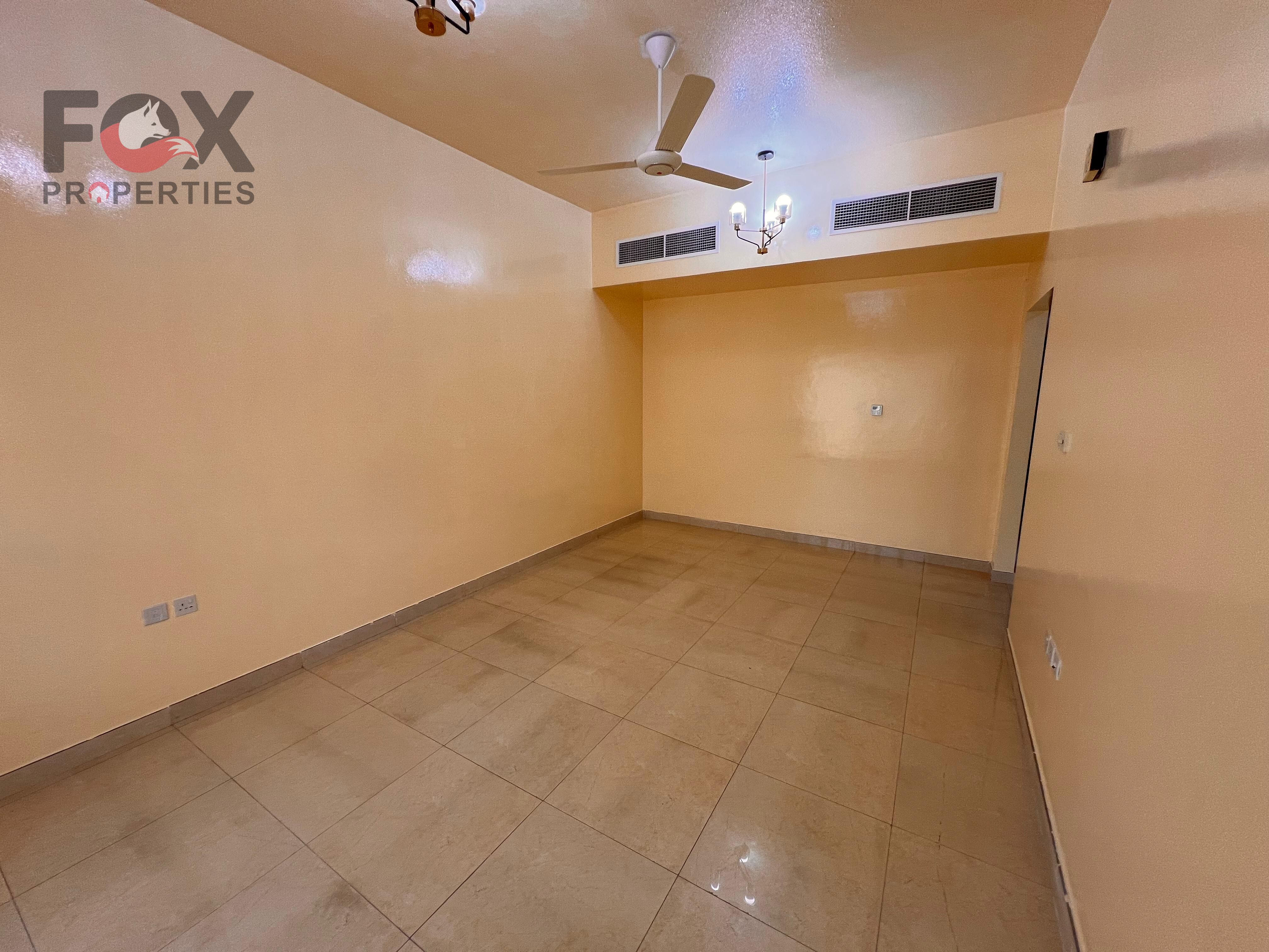 Central AC | 2 bathrooms | Separate hall | Spacious balcony | Close to schools | Near Mohammed Bin Zayed Road | Al Mowaihat 3