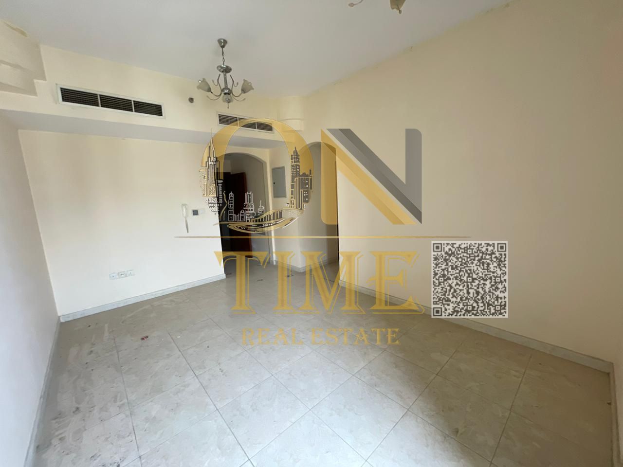 Two bedrooms and a living room in Al Nuaimiya, with a balcony and central air conditioning, near the Gulf Bridge, 38,000
