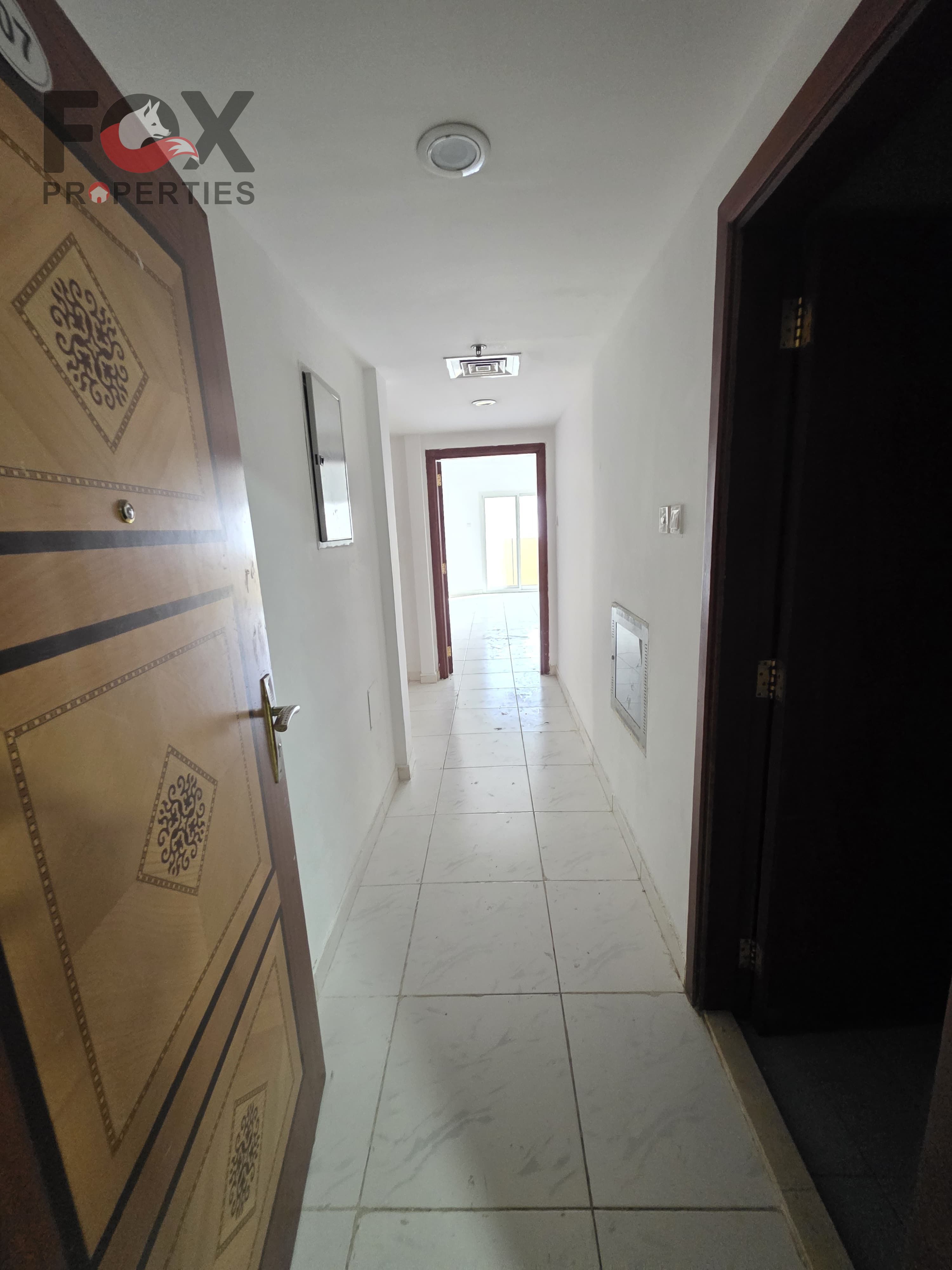 Two-bedroom apartment with living room for rent in a prime location, offering views of two streets