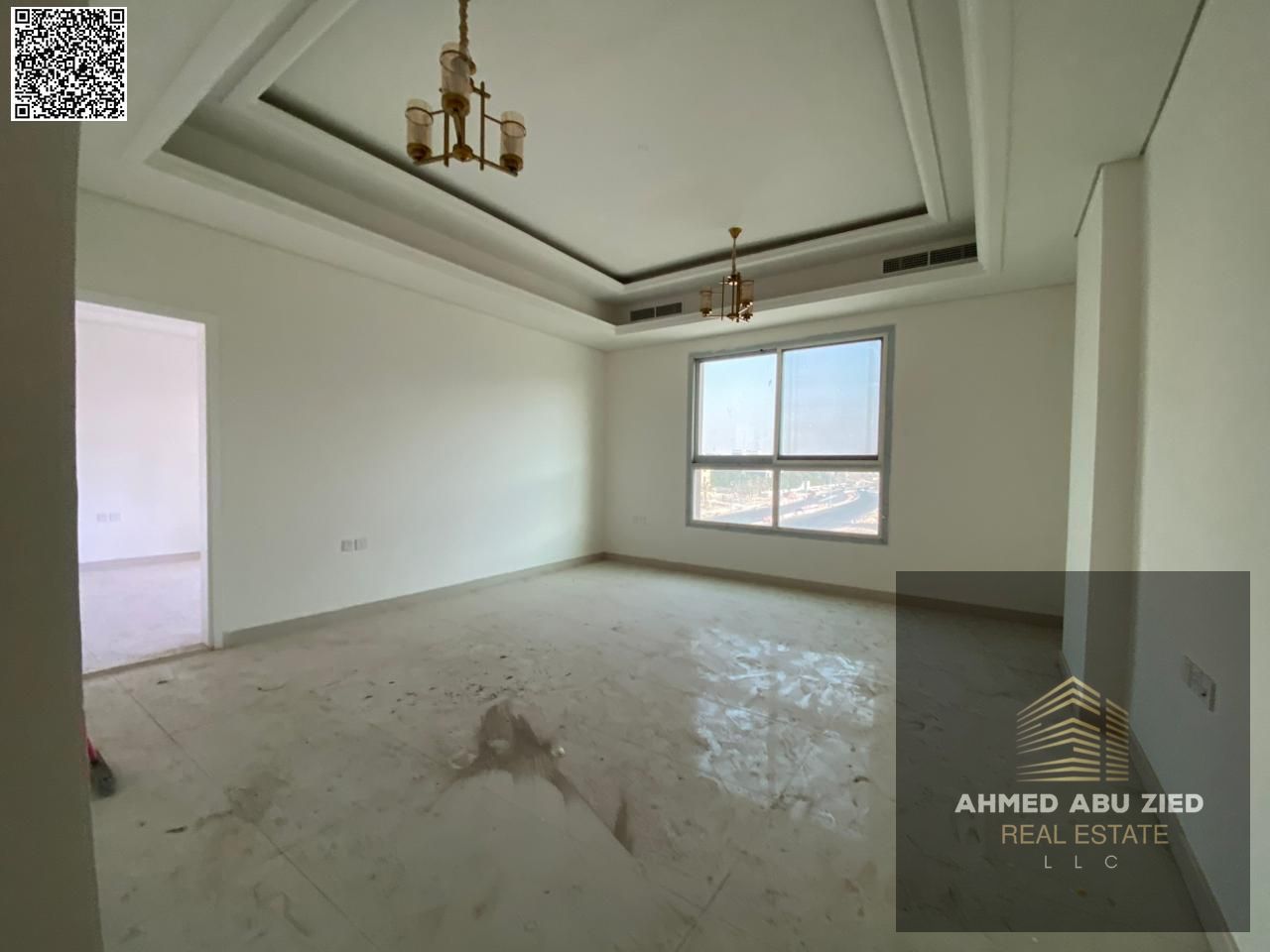 3BR hall apartment, first tenant in Al Mowaihat 3, Ajman. Free month, balcony, central AC, built-in wardrobes, 3 baths, flexible payments, easy Dubai