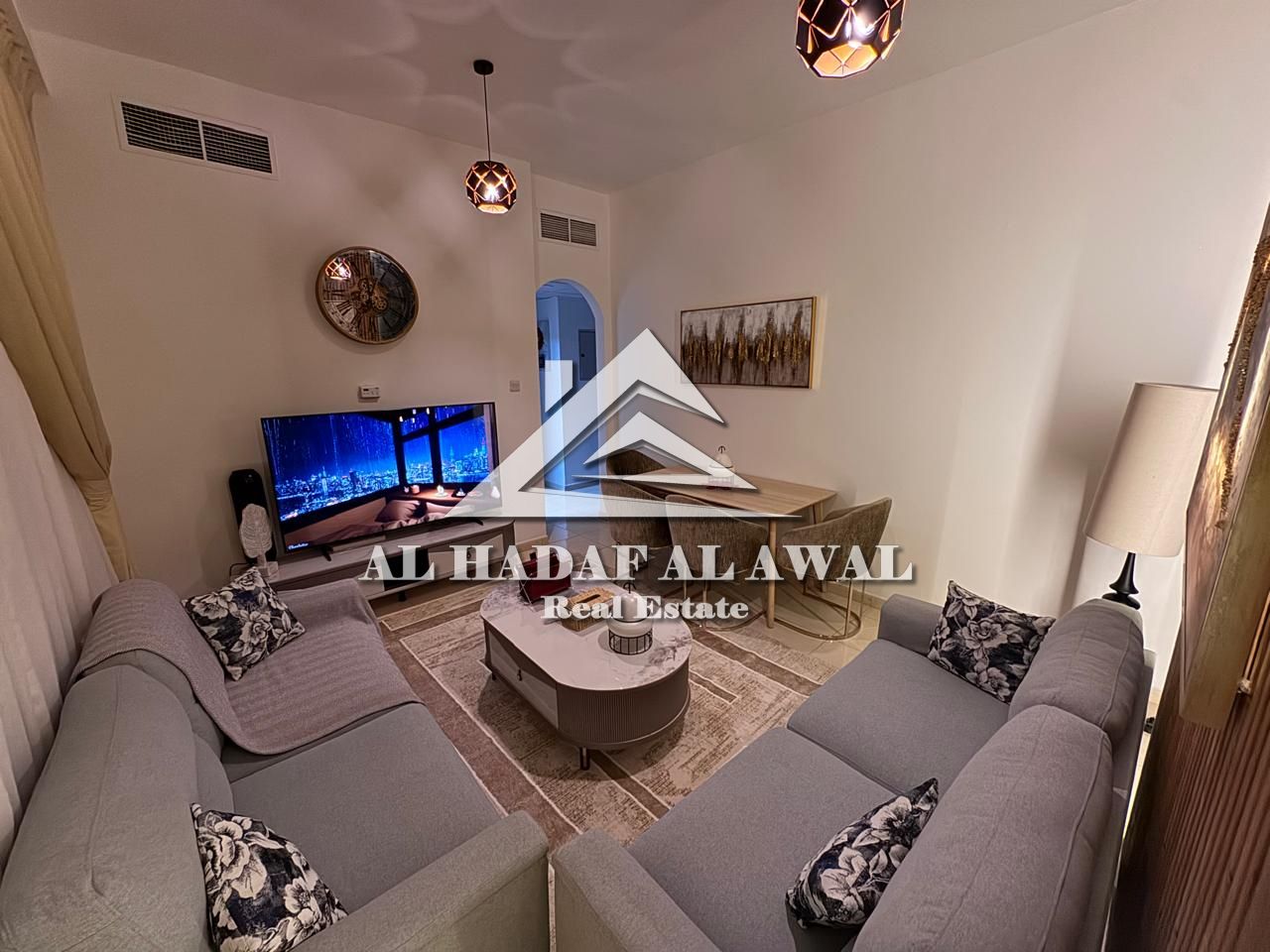 1BR hall in Al Majaz 3, front of Al Safya Park. Clean apartment, good location, close to services. Rent 4400 including internet, deposit 1000 .