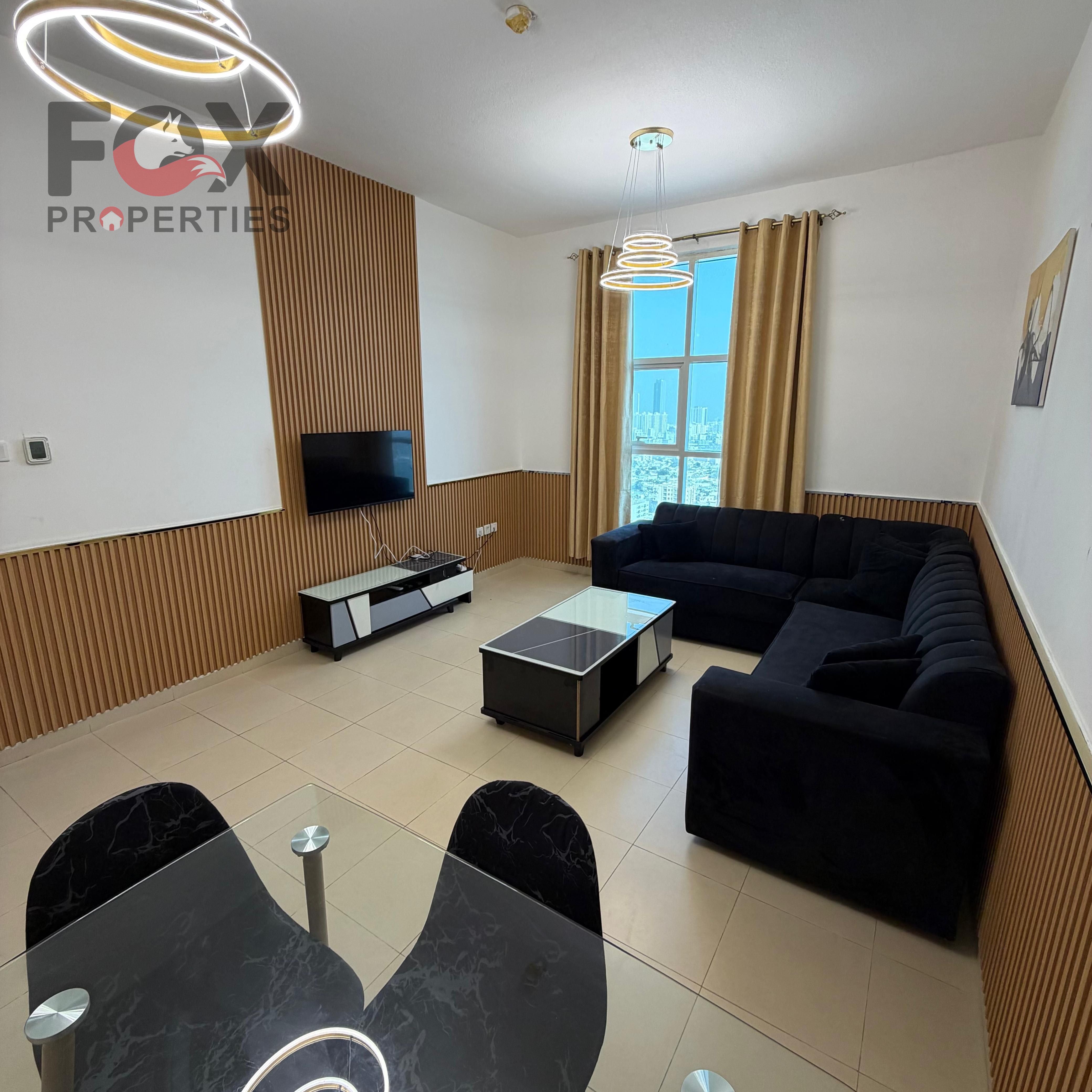 Luxurious two-bedroom apartment with a living room and stunning open view, located in City Tower, Al Nuaimiya 3