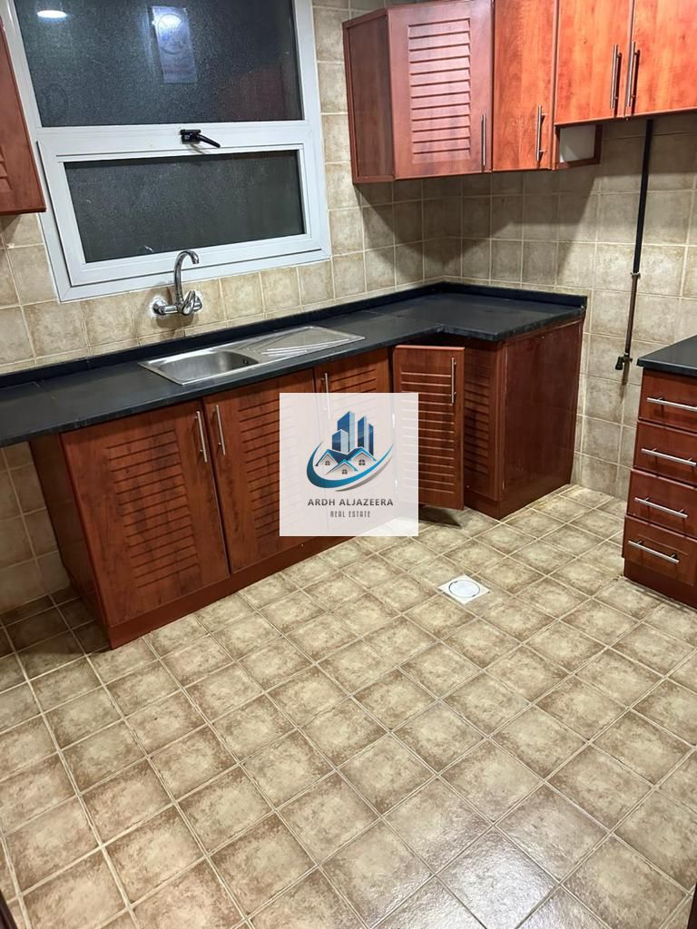 1bhk with close hall balcony in just 38000 fully family building near Sahara center near dubai border new style woodish cabinet