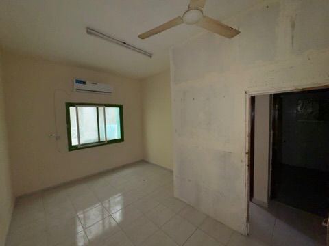 For annual rent in Al Nuaimiya 2 - Ajman, a spacious apartment with an open view and excellent finishes, central air conditioning, family accommodatio