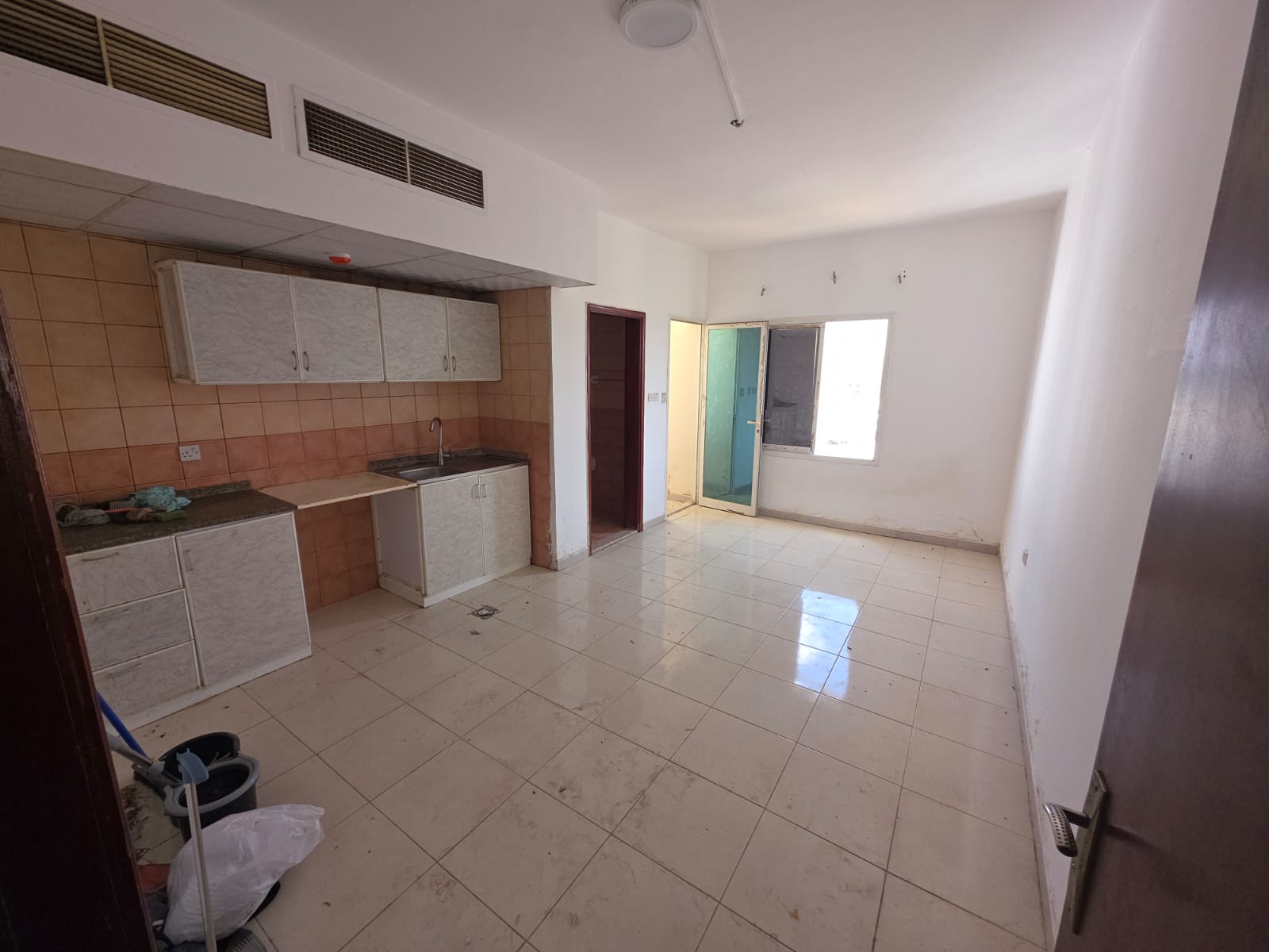 Studio apartment in a prime location with flexible payment options, close to all amenities, and easy access to Dubai and Sharjah.