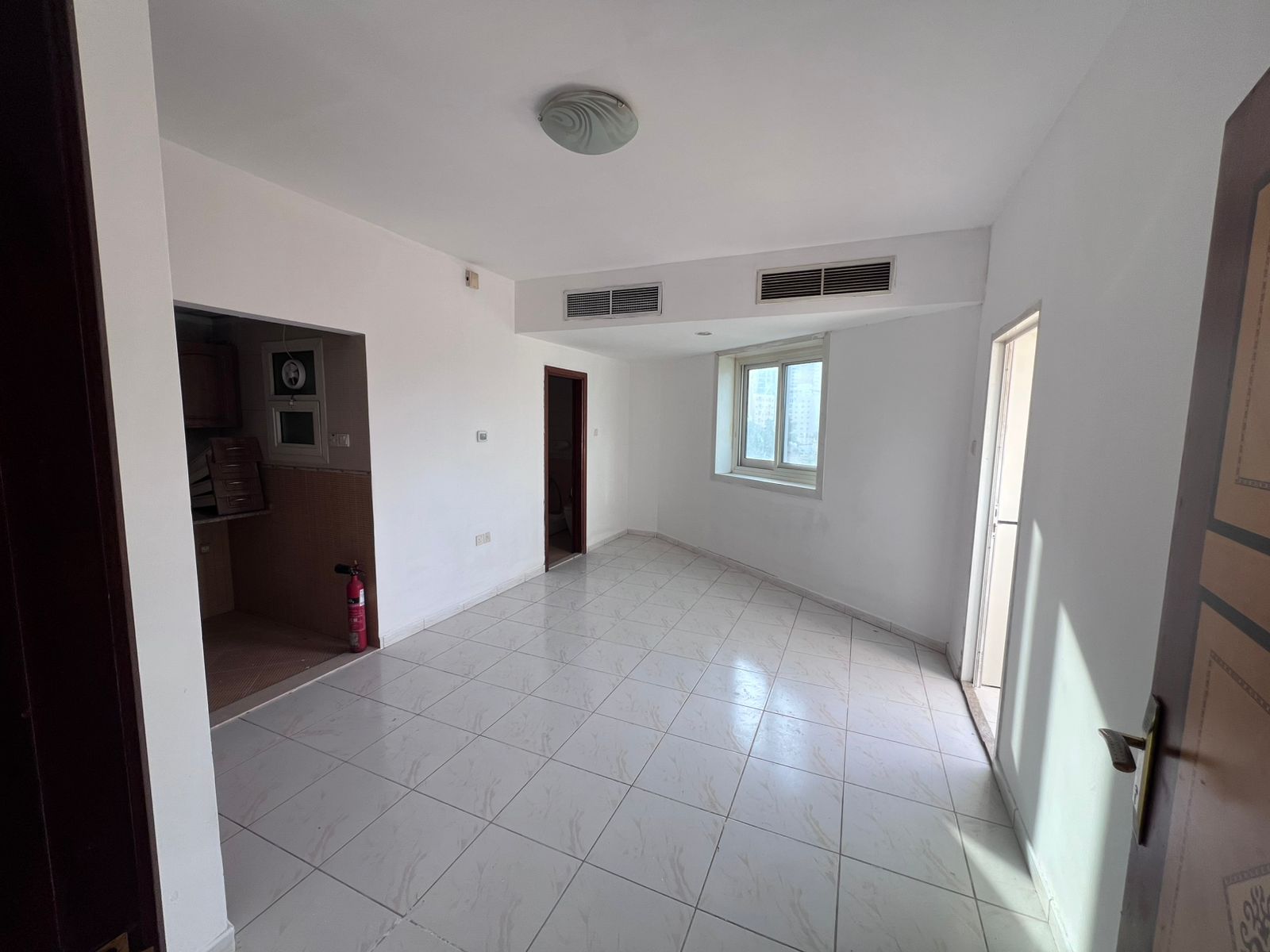 A studio with distinctive features in Al Rashidiya 3 area on the old traffic road, in a vital location close to Ajman Corniche and all basic services