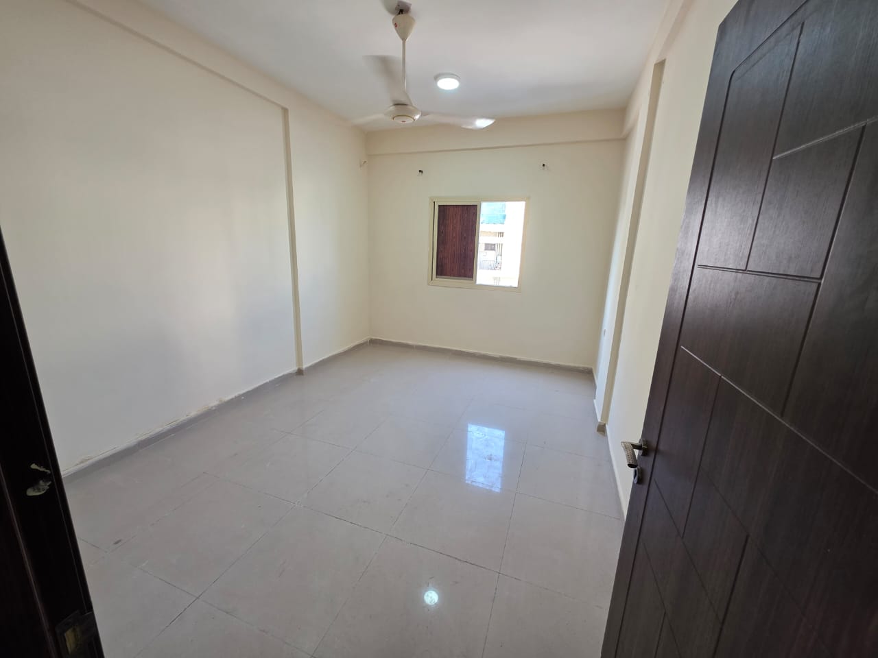 Three bedrooms and a living room # Central air conditioning # Free maintenance # Corniche # Ajman