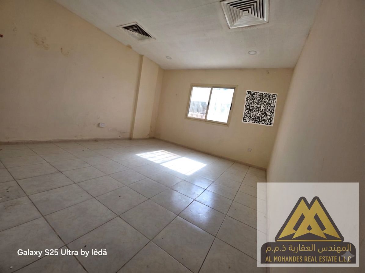 For annual rent: A spacious studio apartment in Al Rashidiya, Ajman, in a prime location next to Falcon Towers, close to all amenities.