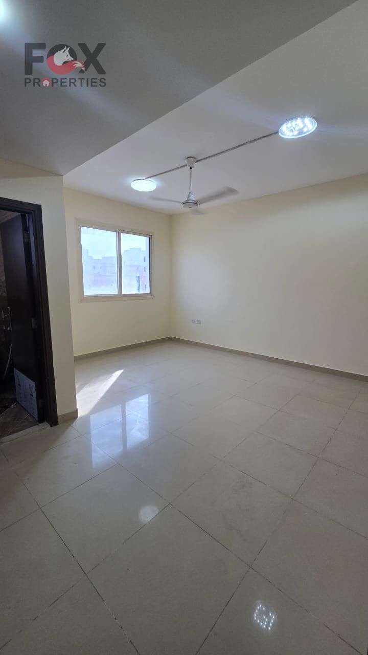 First-floor studio with balcony for annual rent in Al-Aliyah