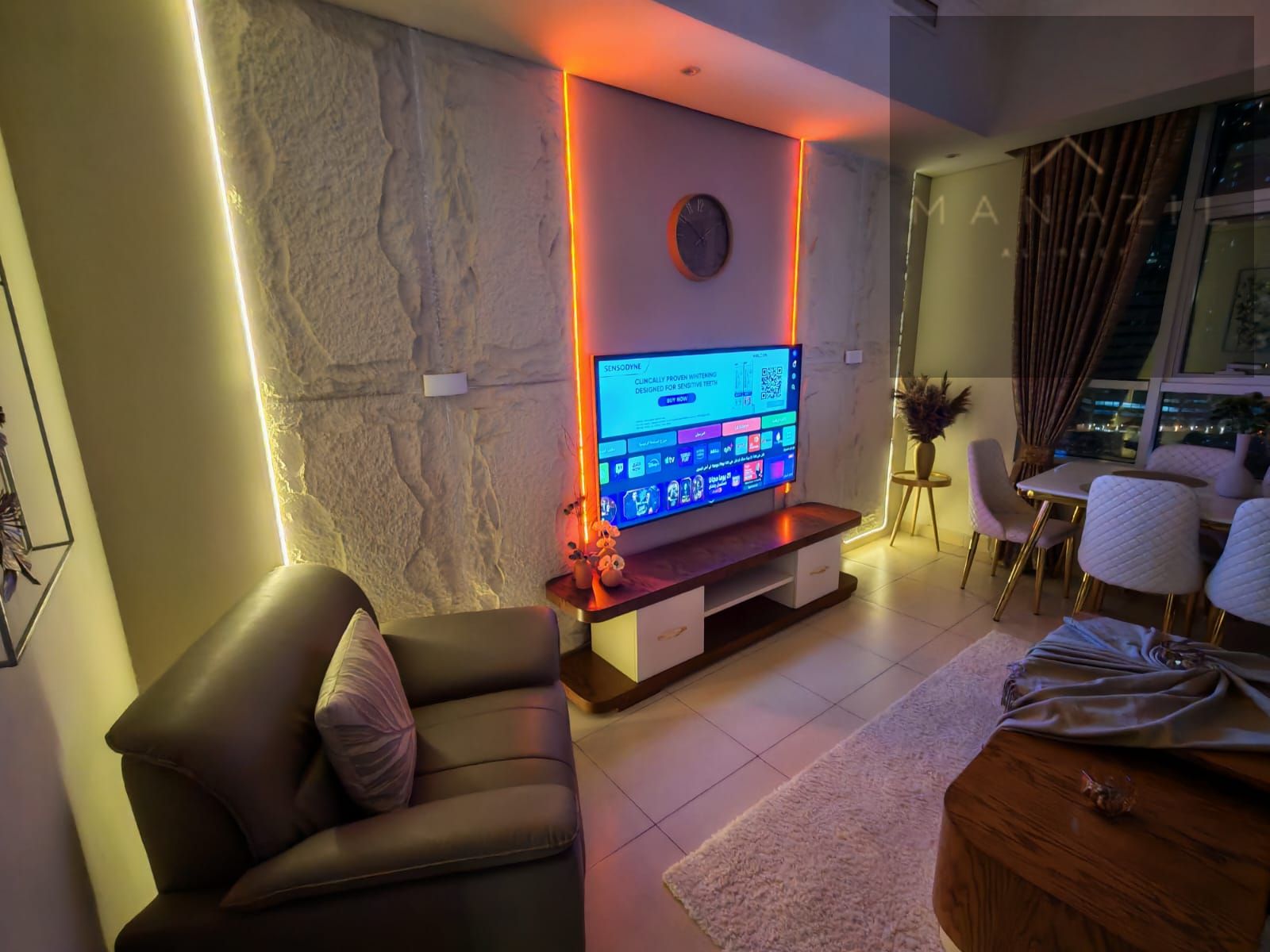 Luxury nautical-style bedroom and living room with an open sea-view balcony