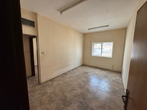 1BR apartment in Al Nuaimiya 1, Ajman. Central AC, 23,000 AED/year, 4 payments, 5,000 AED cheque deposit.