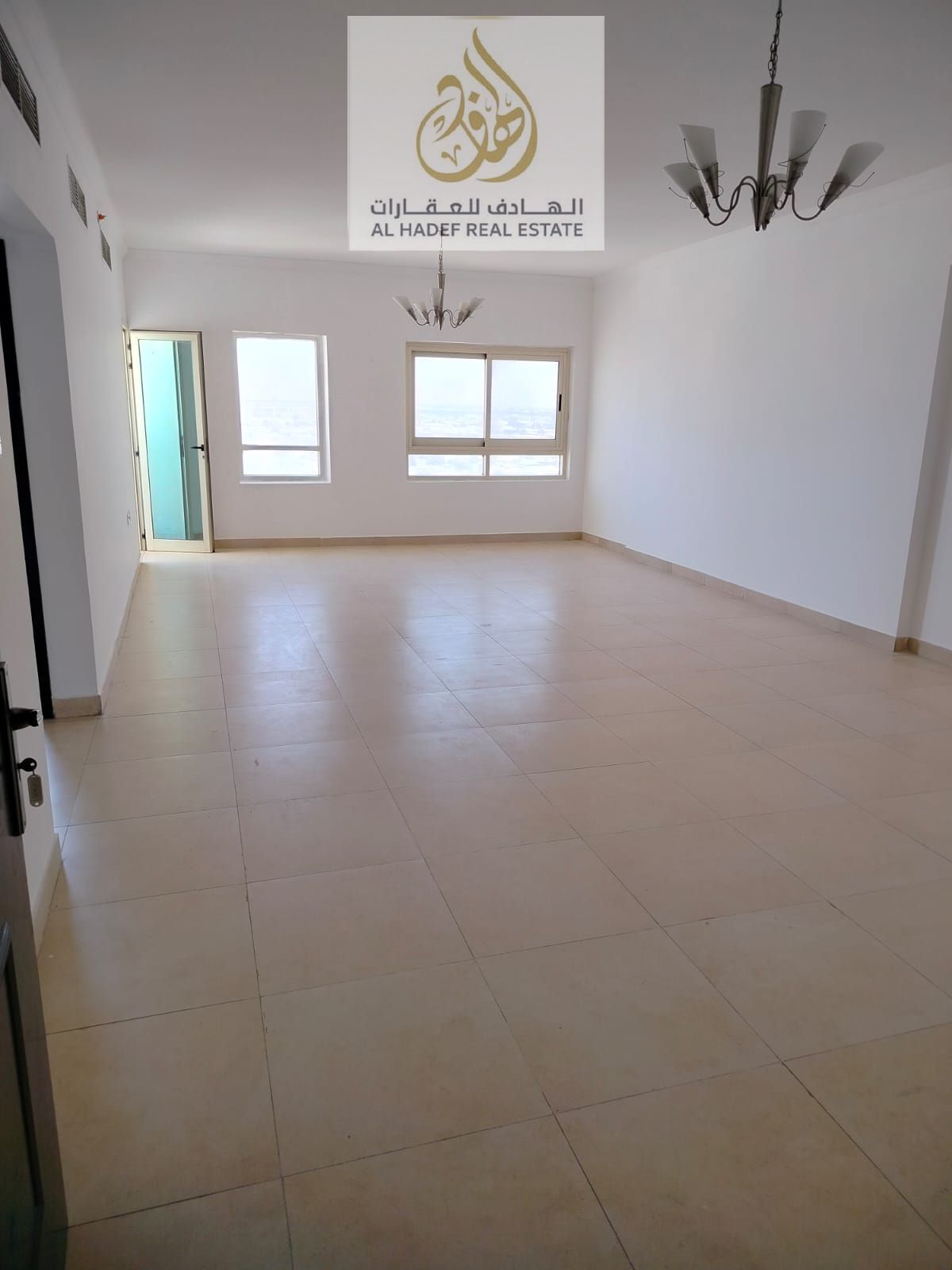 Annual rent in Ajman, Al Nuaimiya 1 area, Al Ittihad Street, near Emirates Markets and DDU DDU Two-bedroom apartment with a living room, balcony, cen