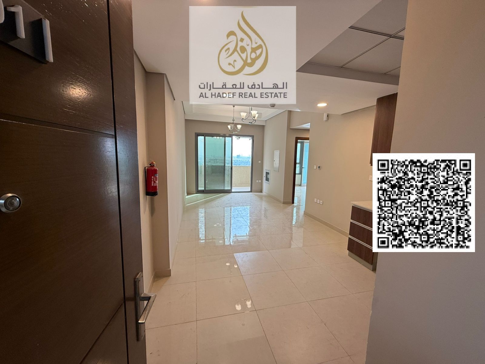 For rent in Ajman Al Amrah, Emirates City, a new tower, first occupant, two bedrooms and a hall with 2 bathrooms and 2 balconies, large area and super