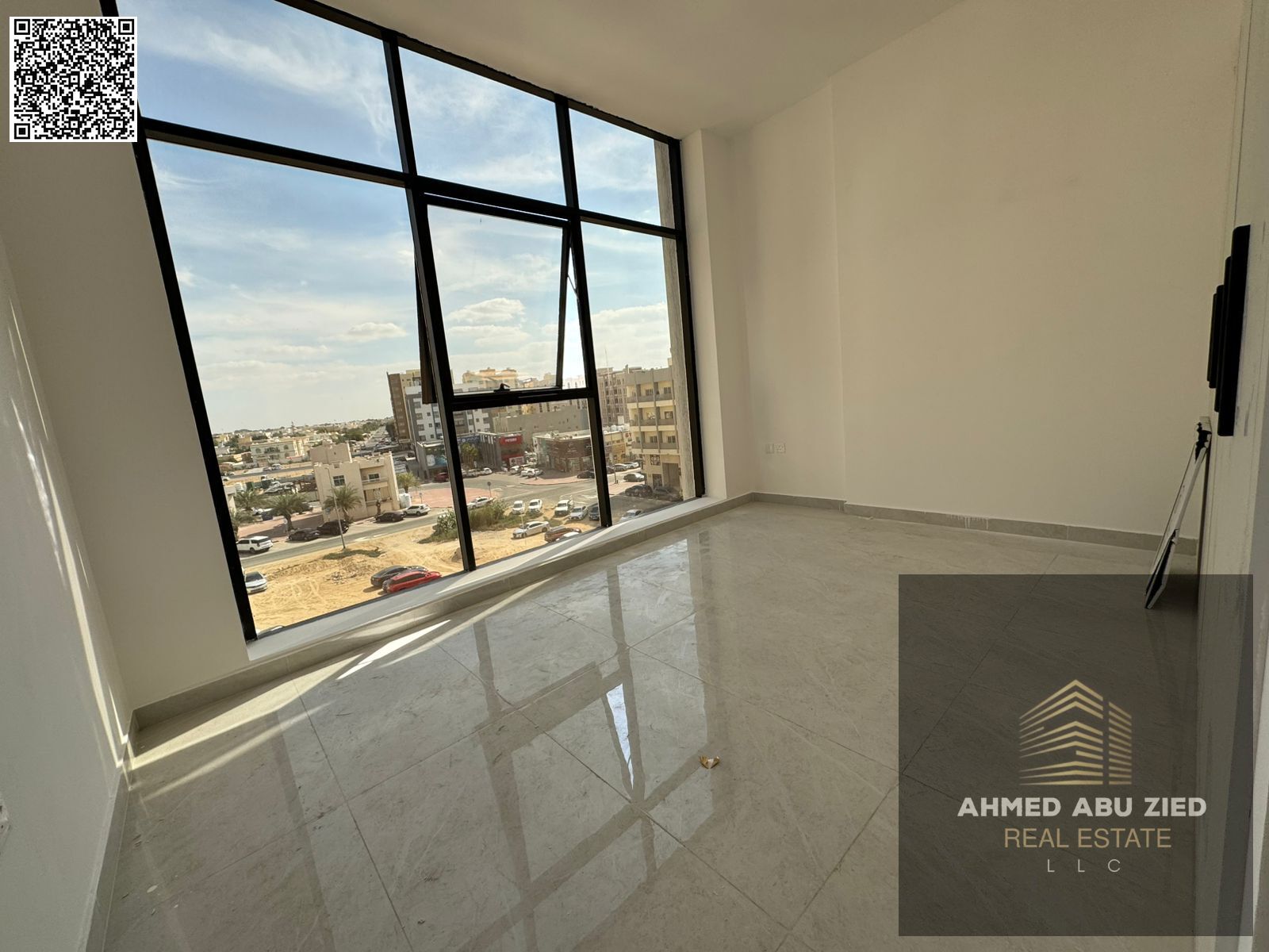 2BR first-tenant apartment with maid room in Al Humaidhiya 1, annual rent, spacious, panoramic view, balcony, central AC, easy Dubai access.