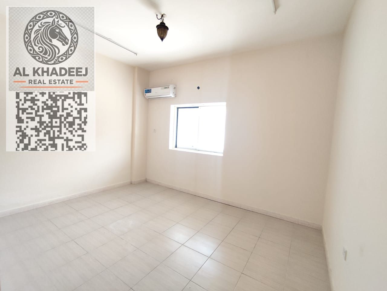 Large studio apartment with a semi-separate kitchen in Al Muwaihat 3 area, close to all services and main roads.