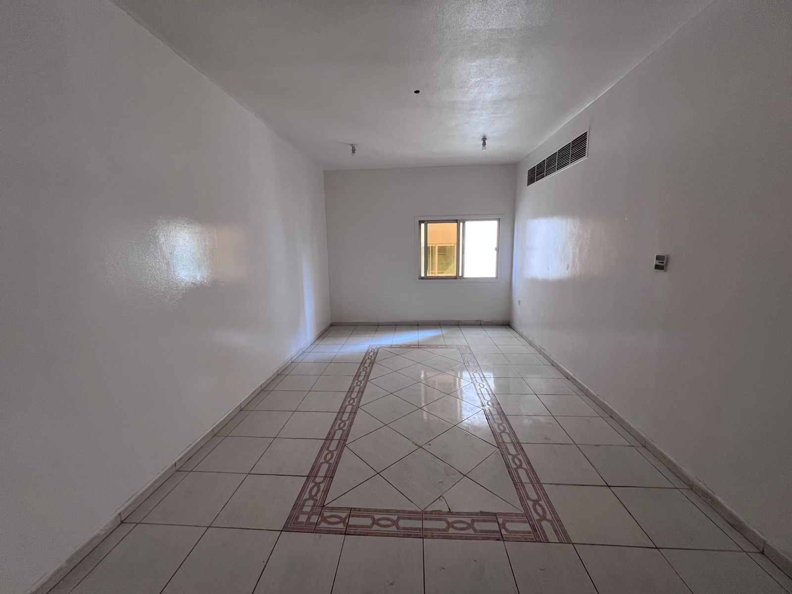 Two-bedroom apartment with a living room in Al Nuaimiya 2 area of Ajman on King Faisal Street, a prime location close to all essential services such
